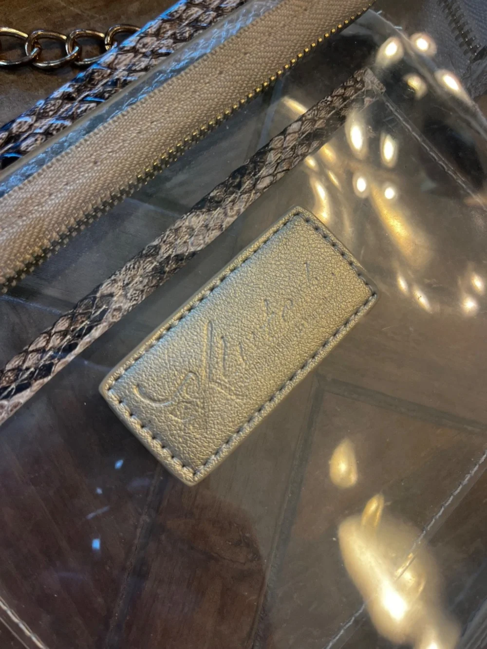 Clear see through stadium bag snake skin print hand bag purse.